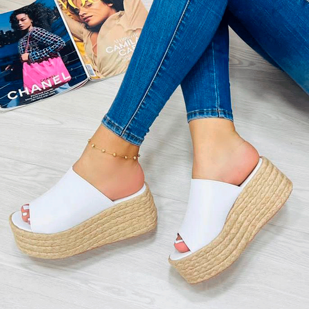 Sandalias en cuña en yute tipo zueco