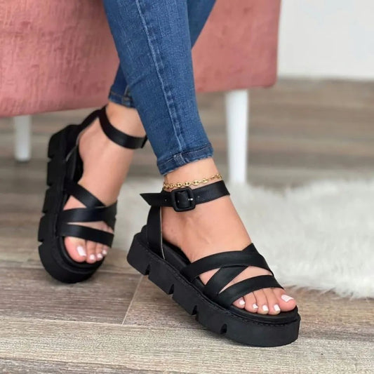 Sandalias planas de hule con suela track tiras